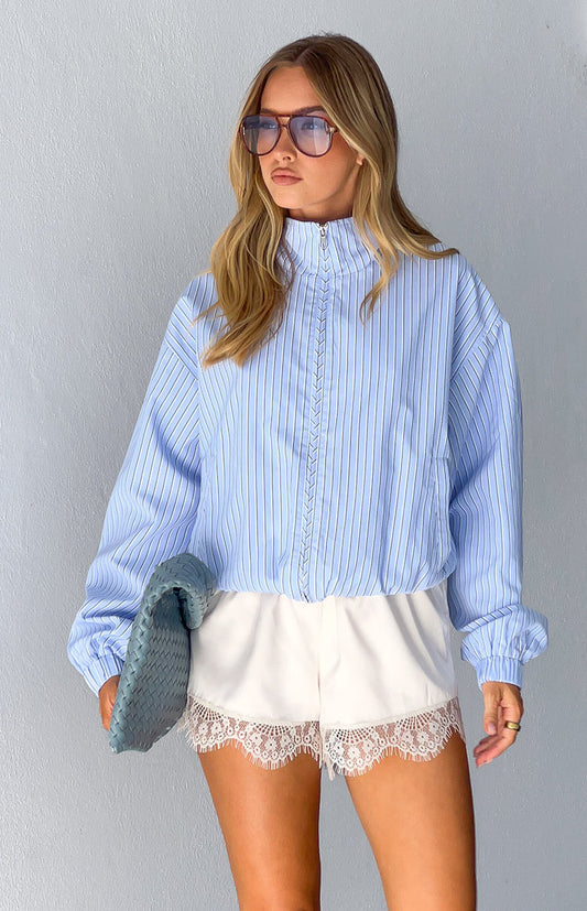 Beginning Boutique Lee Blue Stripe Funnel Neck Jacket light blue striped funnel neck jacket with half-zip and elasticated hem