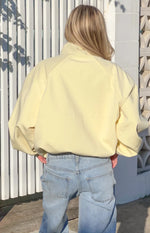 Enya Yellow Funnel Neck Sports Jacket Image