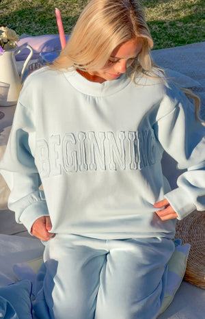 Remy Blue Applique Mock Neck Sweater