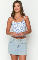 Beginning Boutique Siletto Star Light Wash Denim Low Rise Mini Skirt light wash denim low rise mini skirt with raw hem